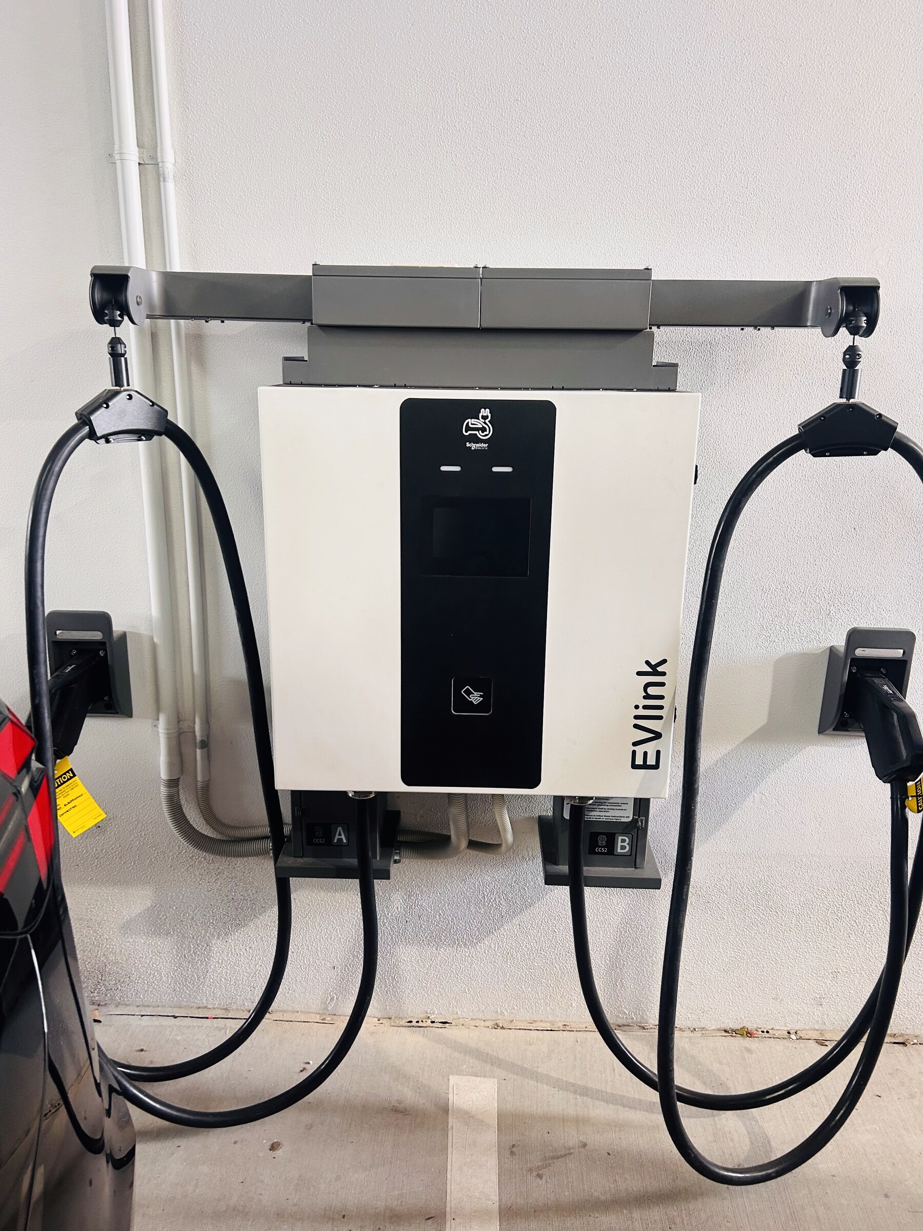 Schneider EVlink wall-mounted EV charger at BMW Motorline Brisbane